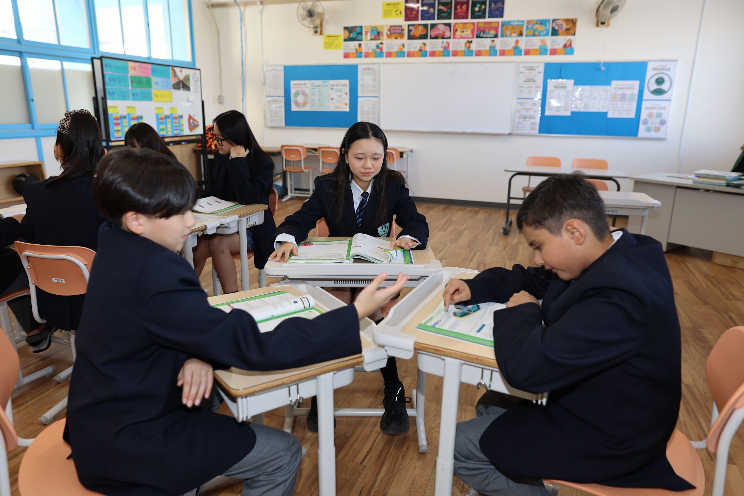 Junior Secondary School Students work together in IB school project work